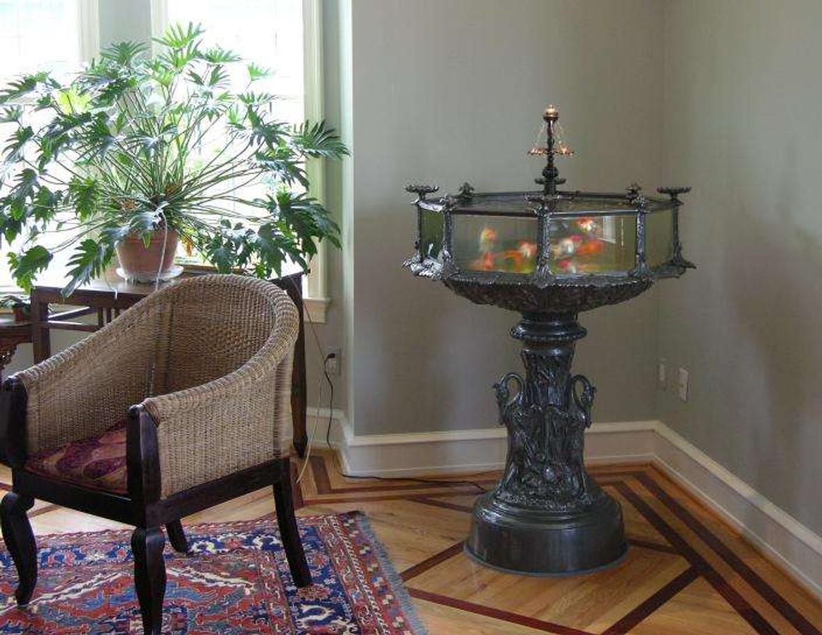 36 gallons freshwater fish tank (mostly fish and non-living decorations) - Victorian Style Aquarium, 36 gallon, with a brass & bronze central fountain A hand made reproduction of an 1870's classic, which was one of the first American made aquariums. 57 inches tall X 38 inches wide