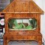 5 gallons freshwater fish tank (mostly fish and non-living decorations) - Antique Tiki Hut 3 Piece Hood/Tank/Base Made Of Bamboo. Set up with two 25Watt Florescent bulbs. Whisper preset heater for up to 15 gallon tank.