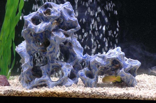 freshwater fish stocking in 55 gallons tank - I have a lot of these ceramic pieces in my tank. I Think they look awesome and the fish seem to enjoy them.

Tom's Aquatic Ceramics
It is handmade, has no lead, and the color will NEVER fade or scrub off
Made in Bemidji MN

Note: I am not Tom. I just like his work