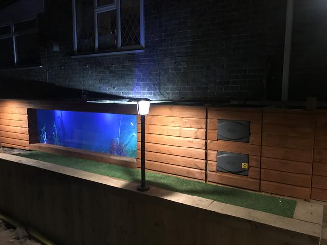 1300 gallons freshwater fish tank (mostly fish and non-living decorations) - Not the best pic I have, but it looks good